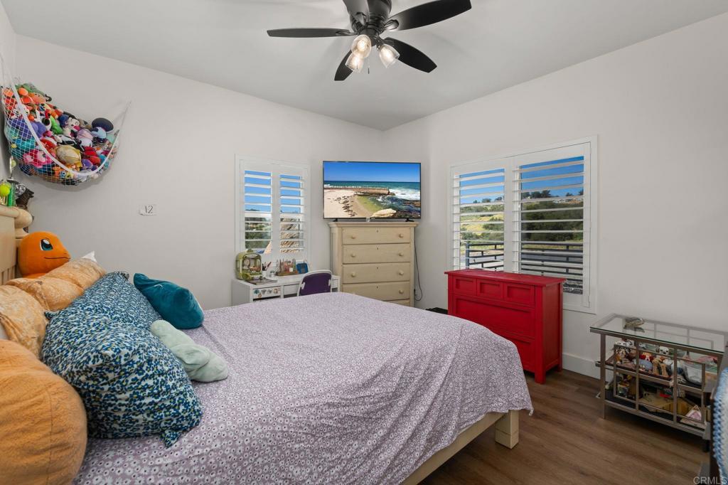 15663 Mathew Road Valley Center, CA 92082 - Photo 28 of 54 a bedroom with a bed and dresser