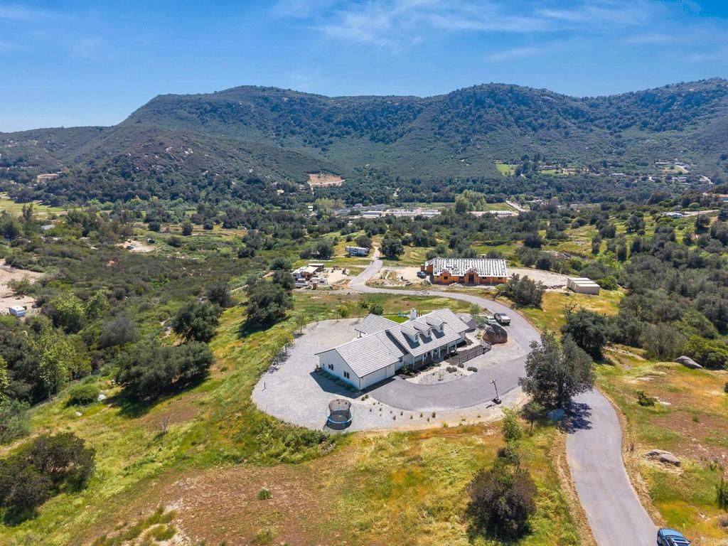 15663 Mathew Road Valley Center, CA 92082 - Photo 46 of 54 a view of a house with a mountain