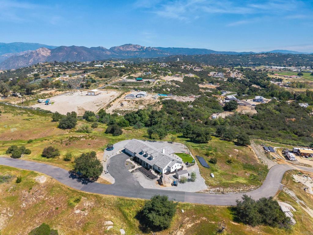 15663 Mathew Road Valley Center, CA 92082 - Photo 49 of 54 a view of a city with an ocean