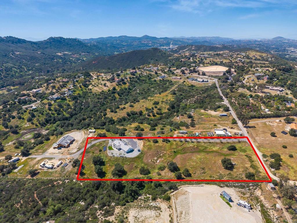 15663 Mathew Road Valley Center, CA 92082 - Photo 54 of 54 an aerial view of residential houses and car parked
