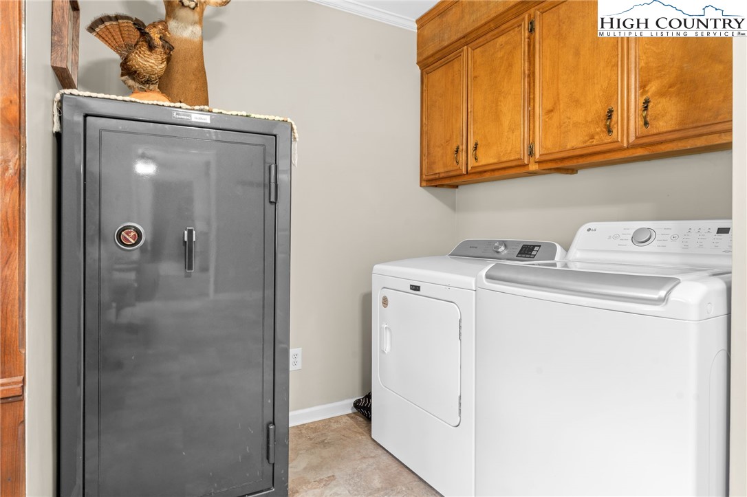 883 Bald Mountain Road West Jefferson, NC 28694 - Photo 20 of 47 a utility room with dryer and washer