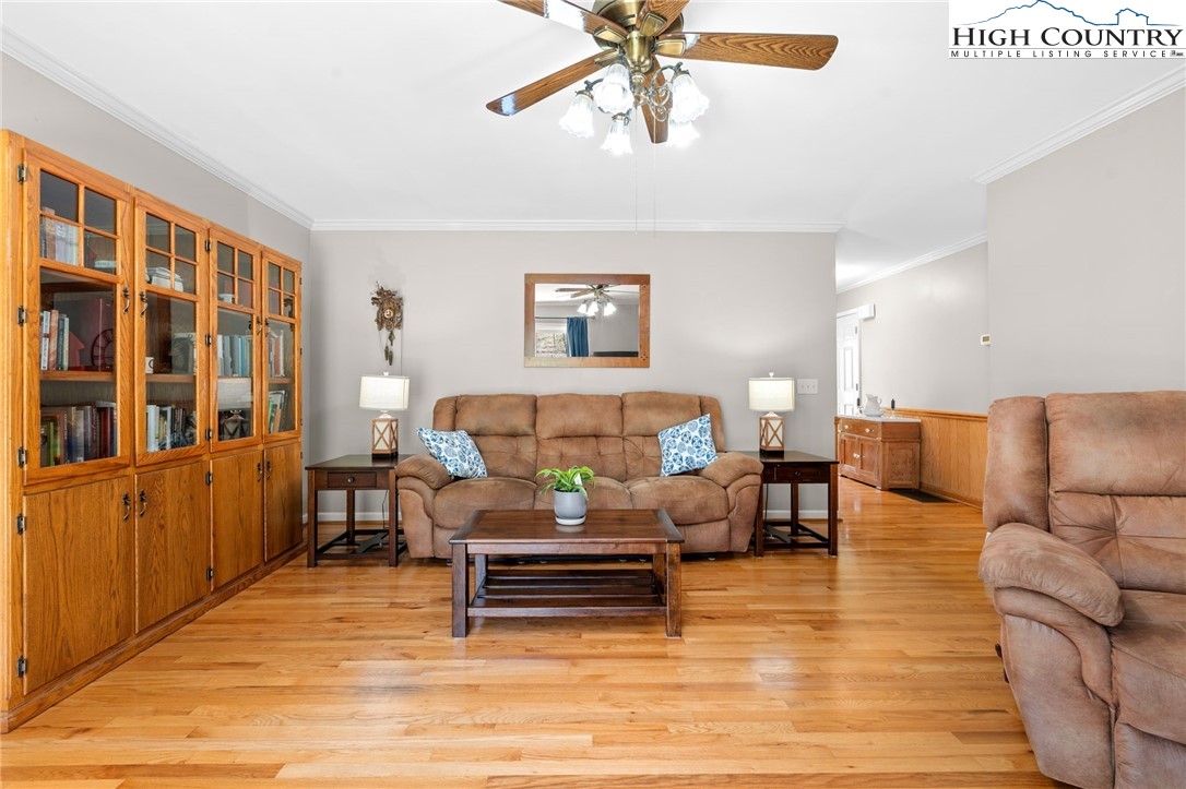 883 Bald Mountain Road West Jefferson, NC 28694 - Photo 5 of 47 a living room with furniture and a rug