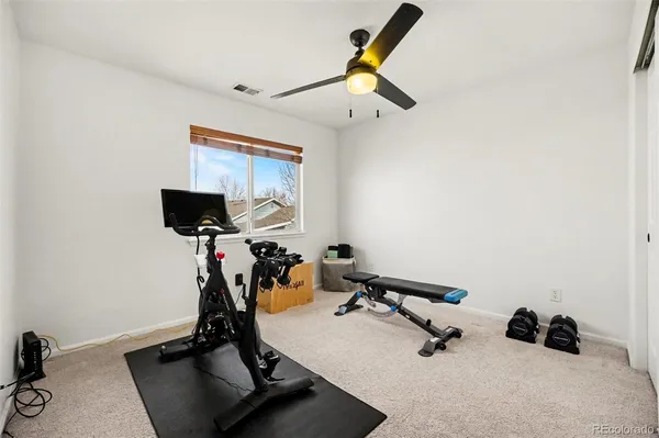 a view of a room with gym equipment