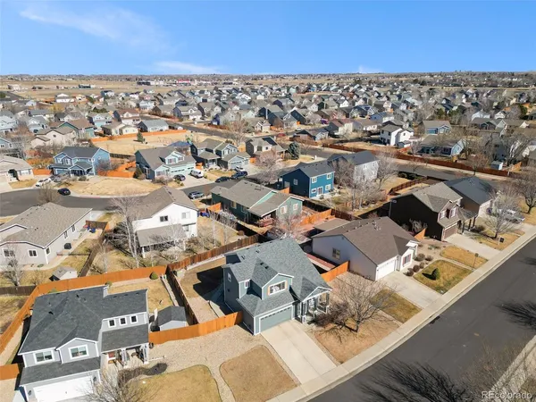 an aerial view of a city with lots of residential buildings