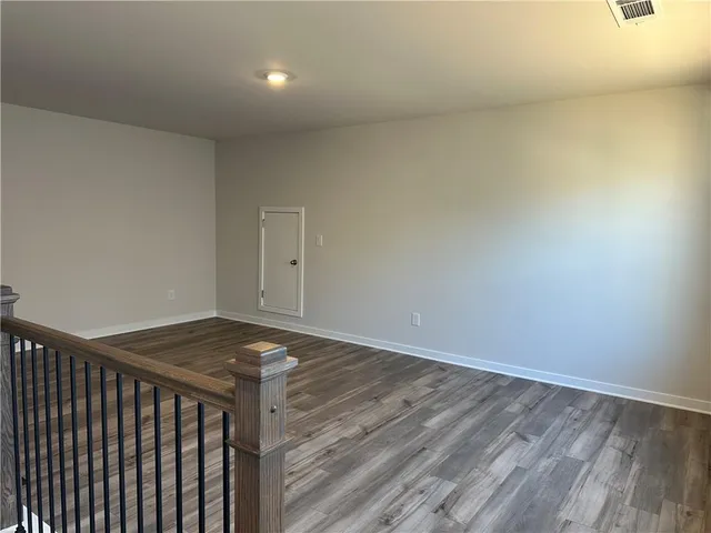 a view of a lake with couches in the patio