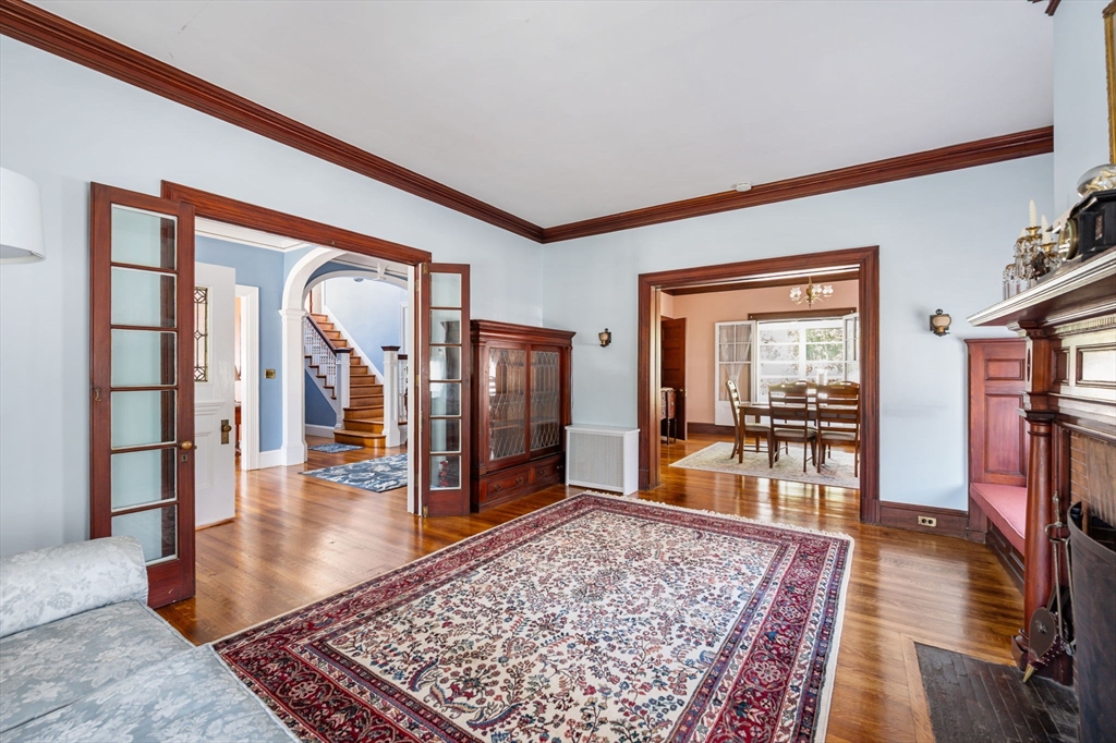 16 Beaumont Street Boston, MA 02124 - Photo 14 of 41 a living room with a rug