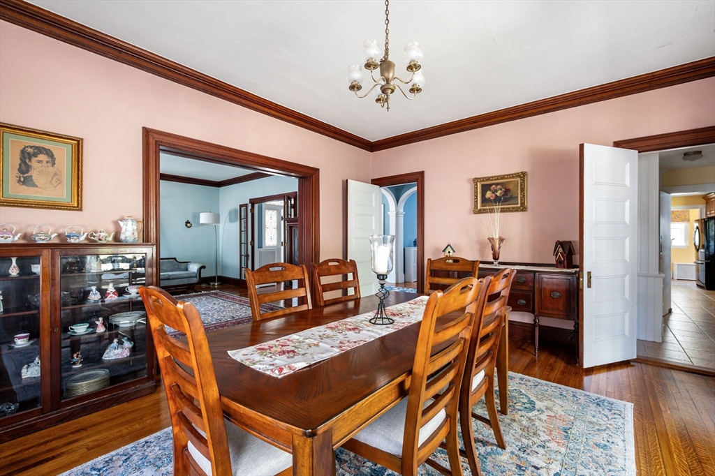 16 Beaumont Street Boston, MA 02124 - Photo 16 of 41 a view of a dining room with furniture and wooden floor