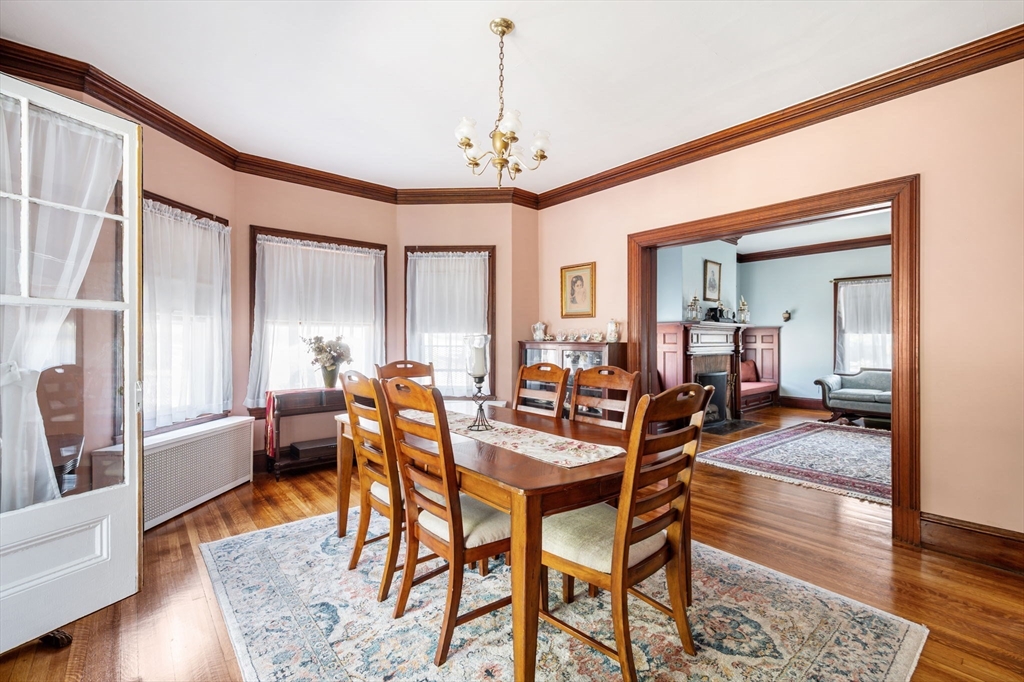16 Beaumont Street Boston, MA 02124 - Photo 17 of 41 a view of a livingroom and dining room