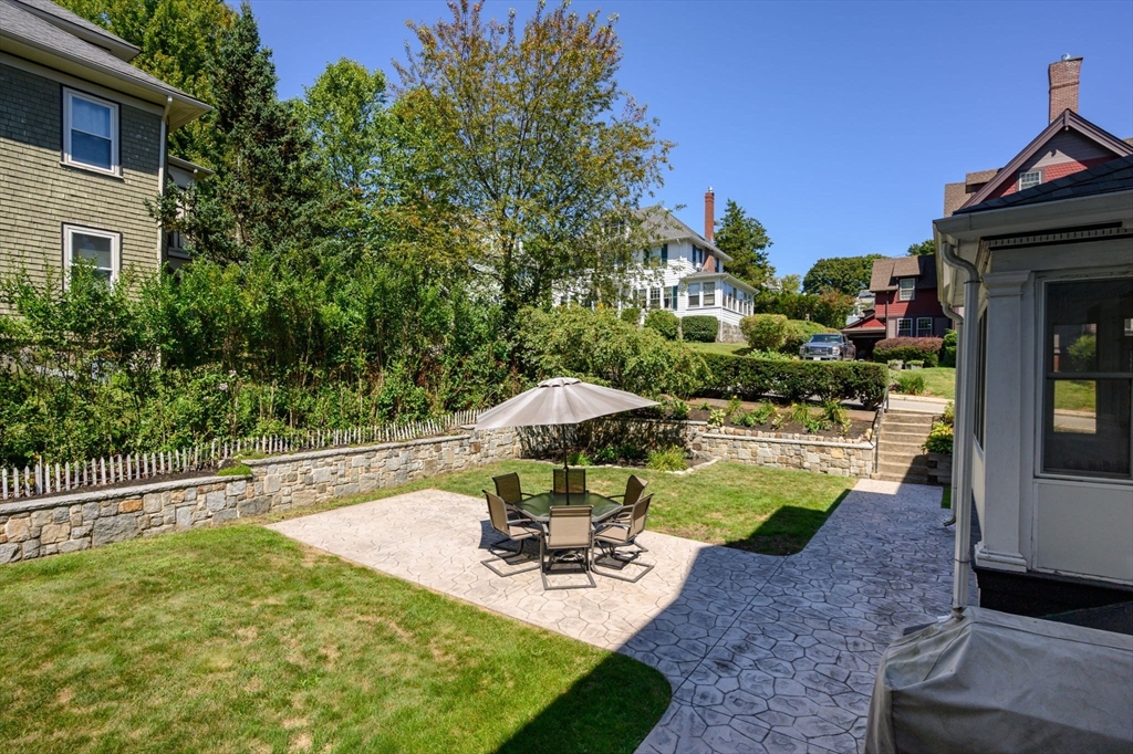 16 Beaumont Street Boston, MA 02124 - Photo 33 of 41 a view of a swimming pool with a patio
