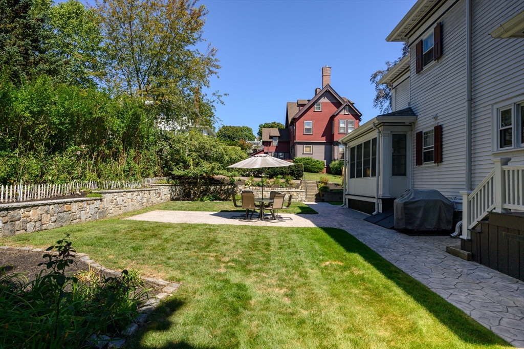 16 Beaumont Street Boston, MA 02124 - Photo 36 of 41 a swimming pool with outdoor seating yard and barbeque oven