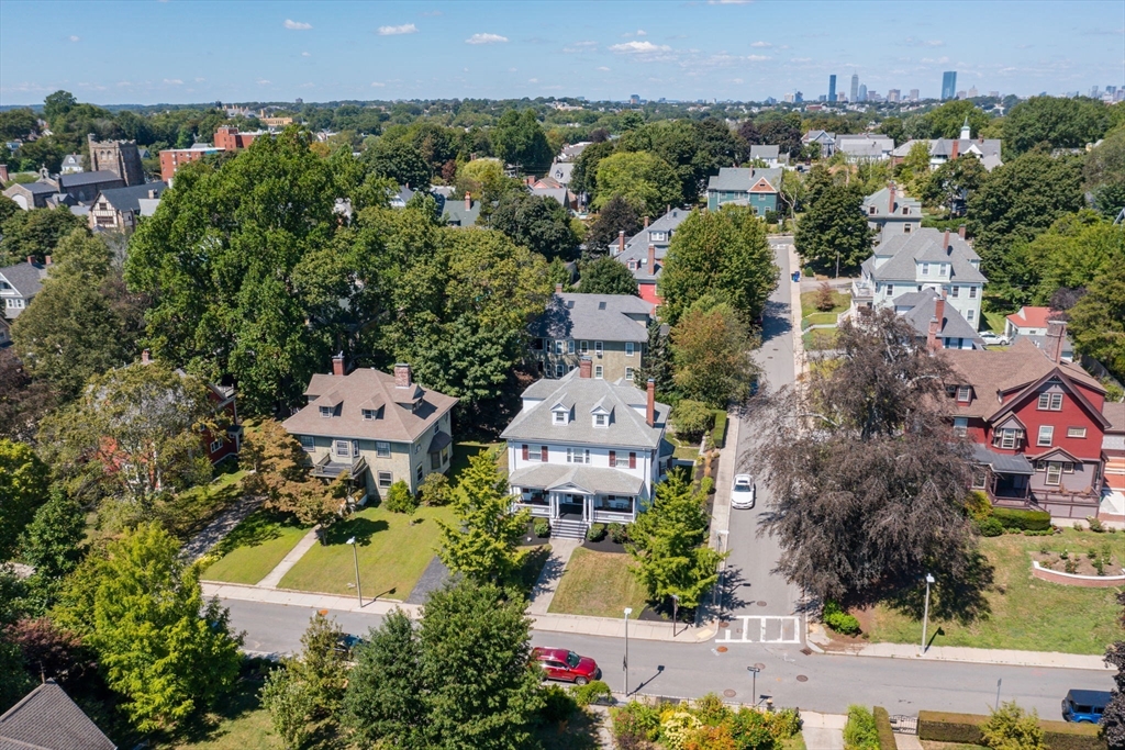 16 Beaumont Street Boston, MA 02124 - Photo 38 of 41 an aerial view of a house with a garden