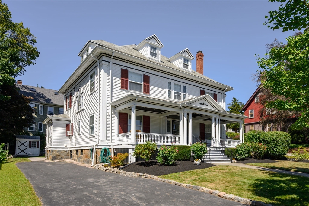 16 Beaumont Street Boston, MA 02124 - Photo 41 of 41 a front view of a house with a yard