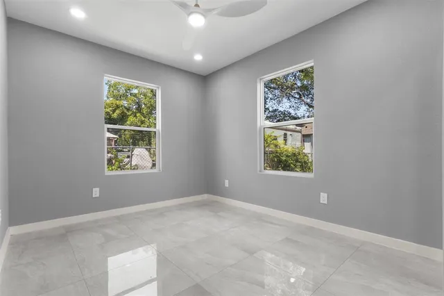 an empty room with windows