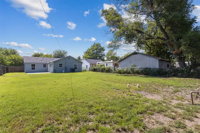 a house view with swimming pool