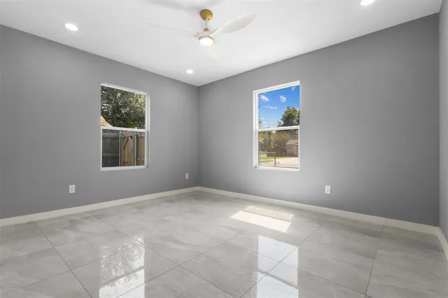 a view of an empty room with a window