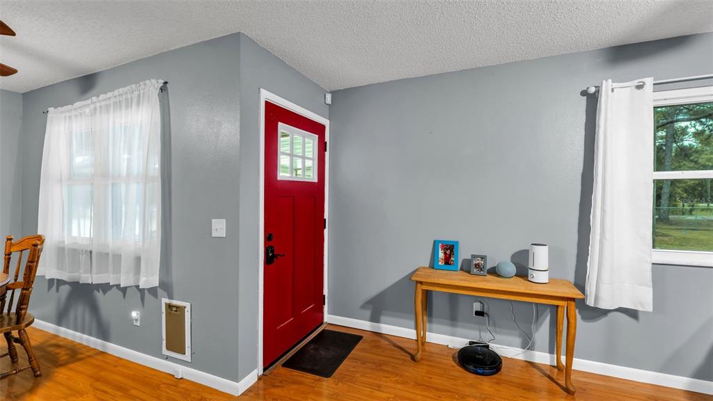 13700 Pine Meadow Road Kathleen, FL 33849 - Photo 12 of 39 a workspace with furniture and window