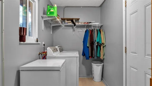 a bathroom with a sink mirror and toilet