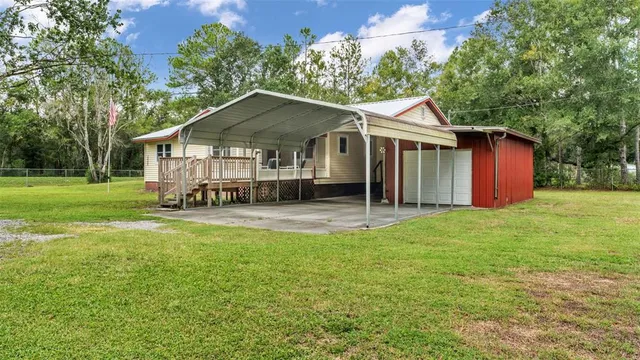 a house view with a garden space