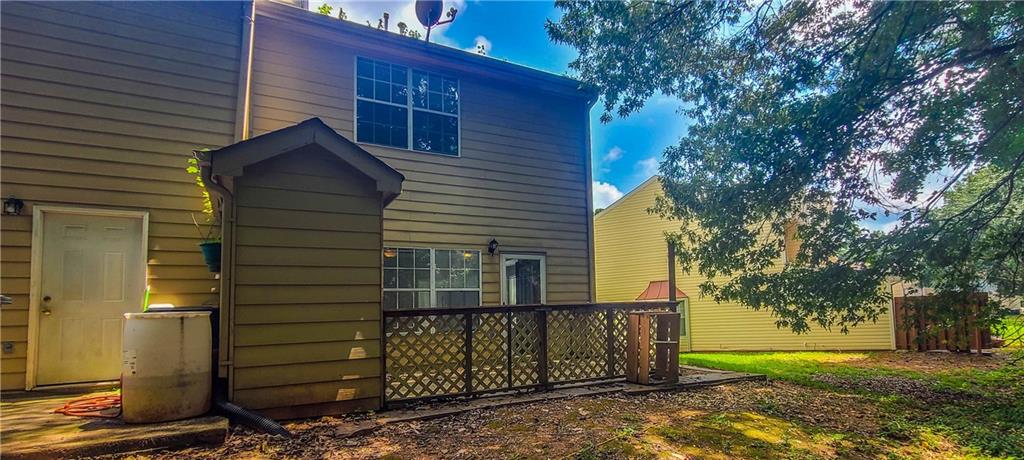 2120 Fairways Court Kennesaw, GA 30144 - Photo 18 of 20 a front view of a house with a yard