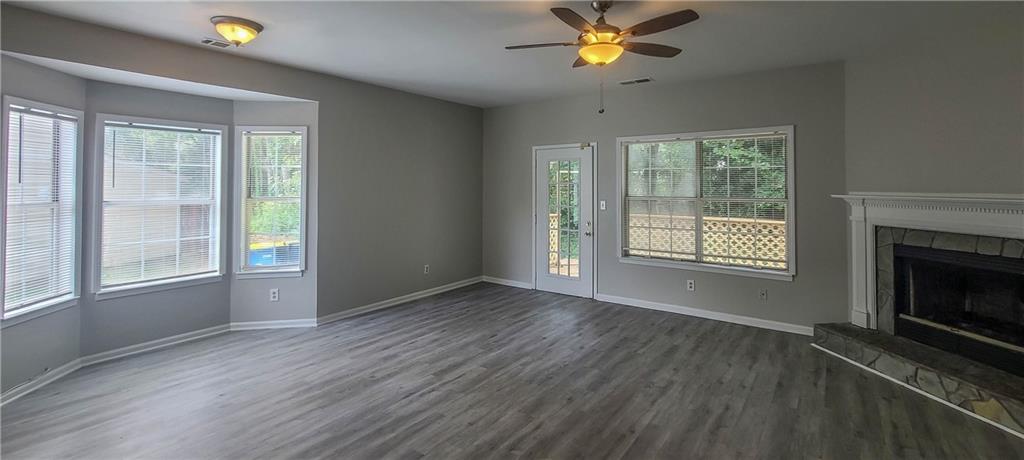 2120 Fairways Court Kennesaw, GA 30144 - Photo 3 of 20 wooden floor in an empty room with a window