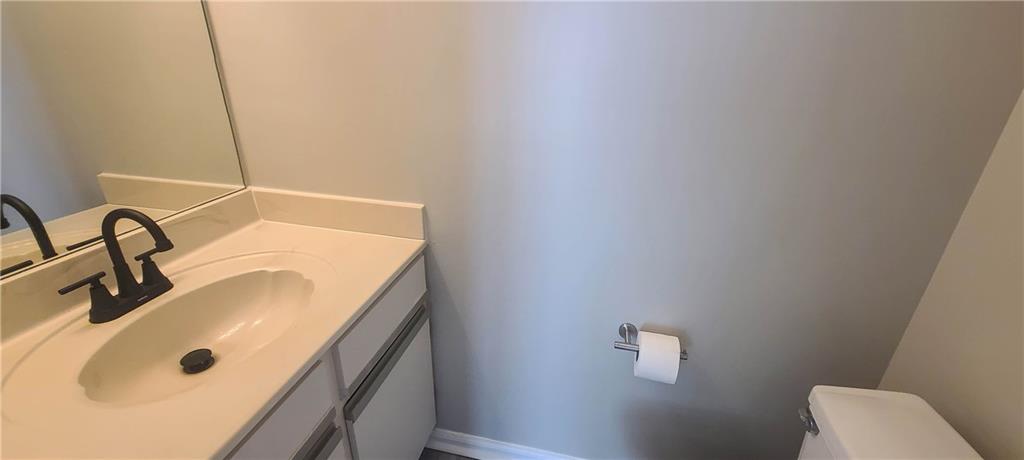 2120 Fairways Court Kennesaw, GA 30144 - Photo 7 of 20 a bathroom with a sink and a vanity