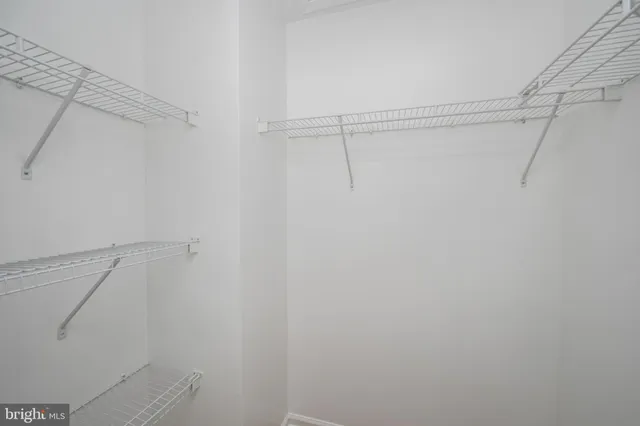 a view of a room with racks on the wall