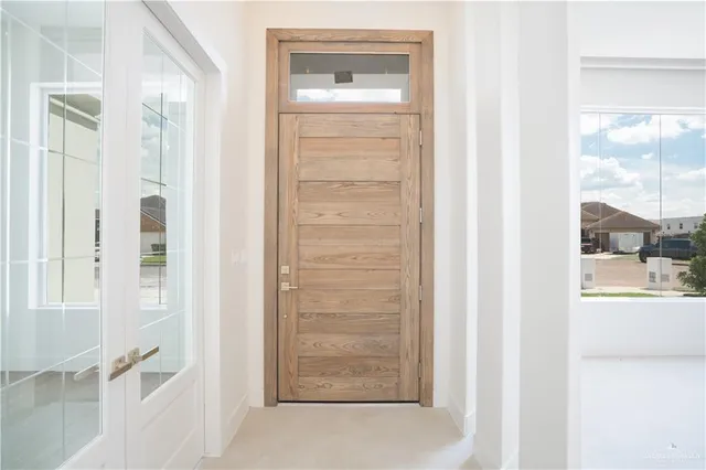 a view of walk in closet with window