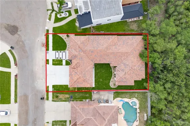 view of houses with outdoor space and street view