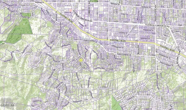 a bathroom with a sink and a shower curtain