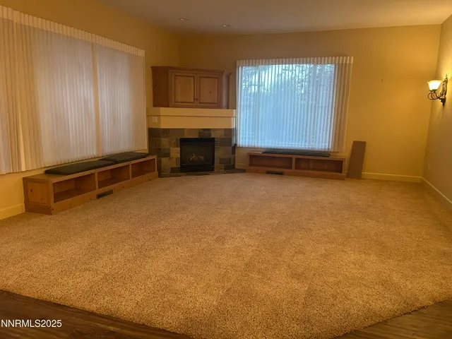 a view of house with a door and wooden floor