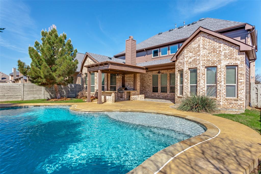 1505 5th Street Argyle, TX 76226 - Photo 2 of 25 a view of a house with swimming pool and porch with furniture