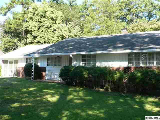 717 Belleview Road Rock Hill, SC 29730 - Photo 1 of 8 a front view of a house with a yard and potted plants