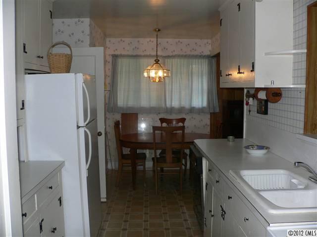 717 Belleview Road Rock Hill, SC 29730 - Photo 7 of 8 a kitchen with refrigerator and window