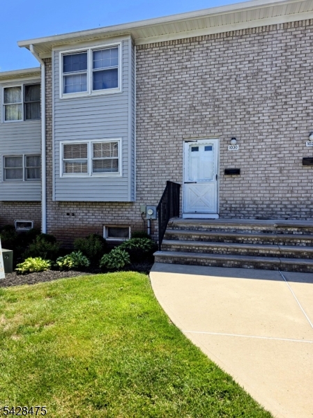 1030 Robin Road Hillsborough, NJ 08844 - Photo 1 of 22 a front view of a house with a yard