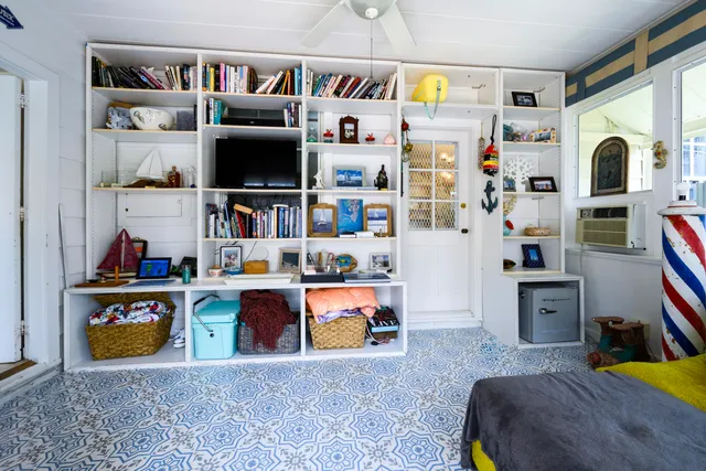 a room with furniture and a flat screen tv