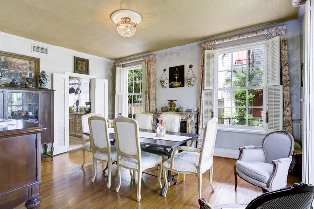 a view of a livingroom with furniture and a window