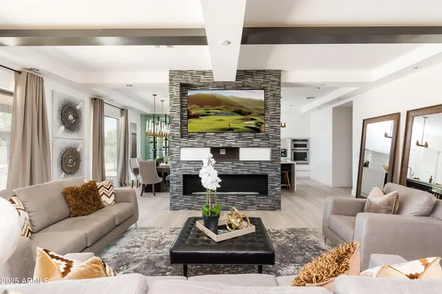 a view of an outdoor sitting area with a table and chairs