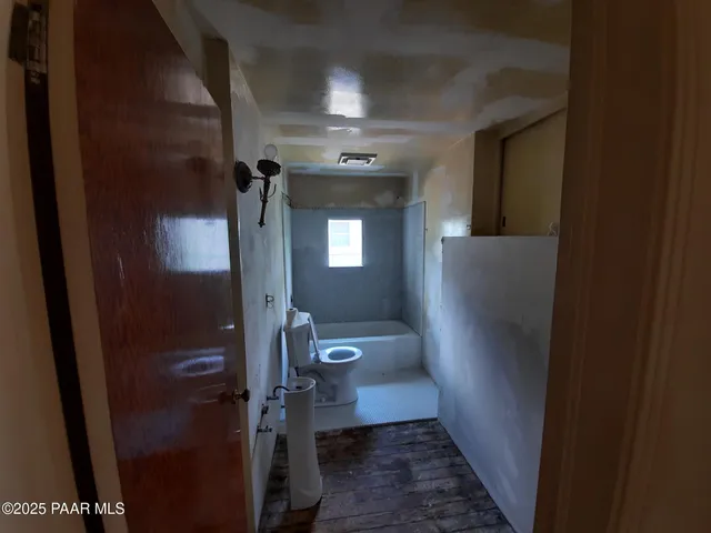 a bathroom with a toilet