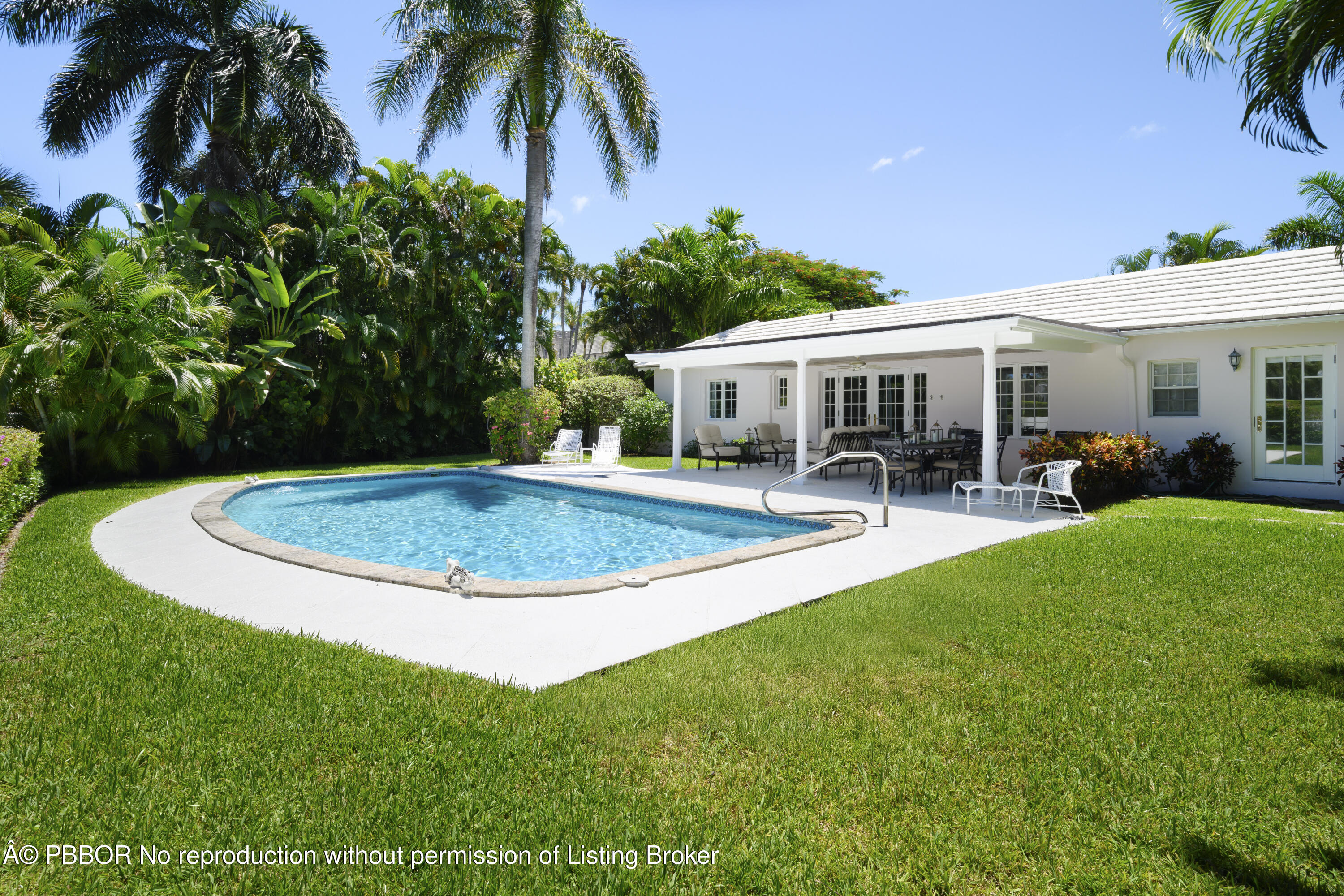 201 Pendleton Avenue Palm Beach, FL 33480 - Photo 22 of 22 a view of a house with a backyard porch and sitting area