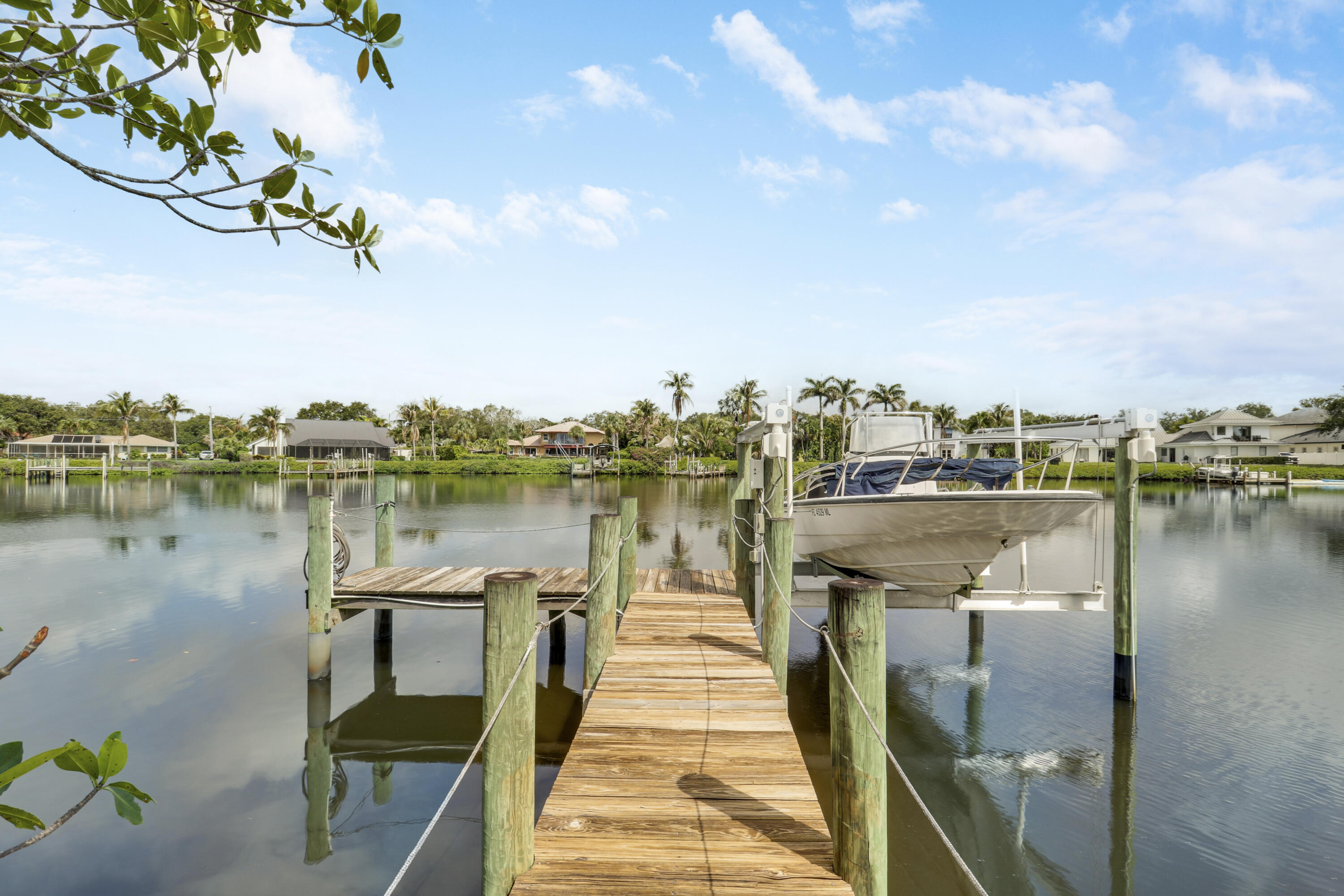 18791 Southeast River Ridge Road Jupiter, FL 33469 - Photo 2 of 25 a lake view with a lake view
