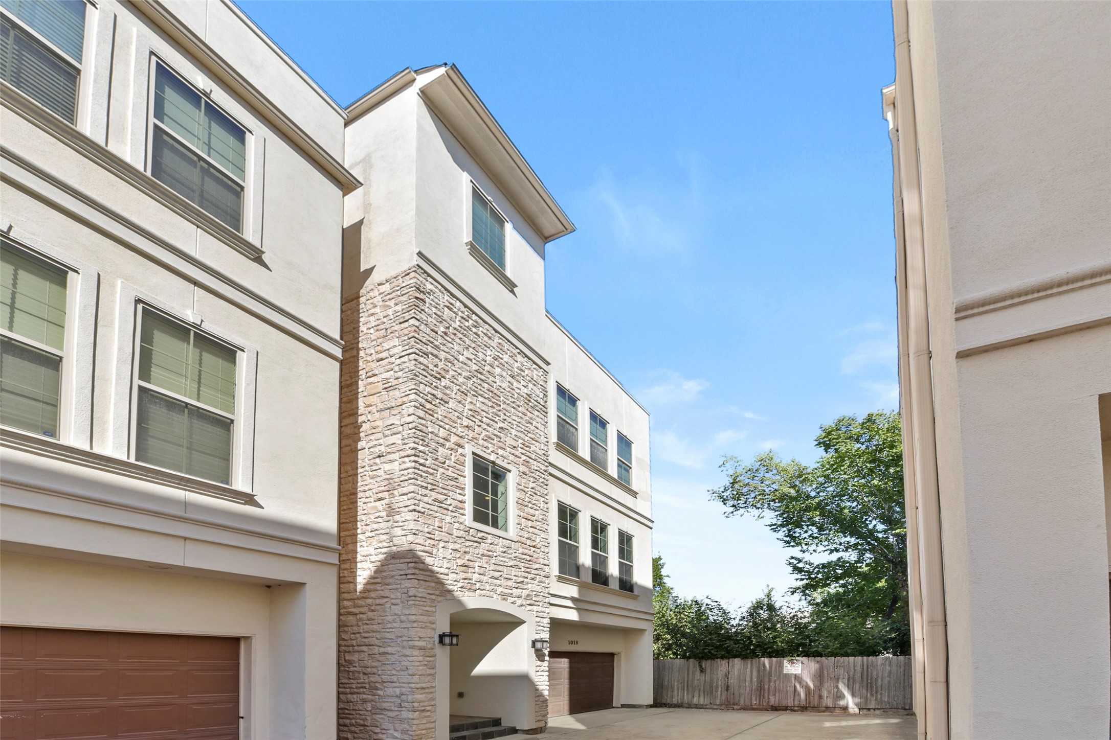 a view of a front of house with a street