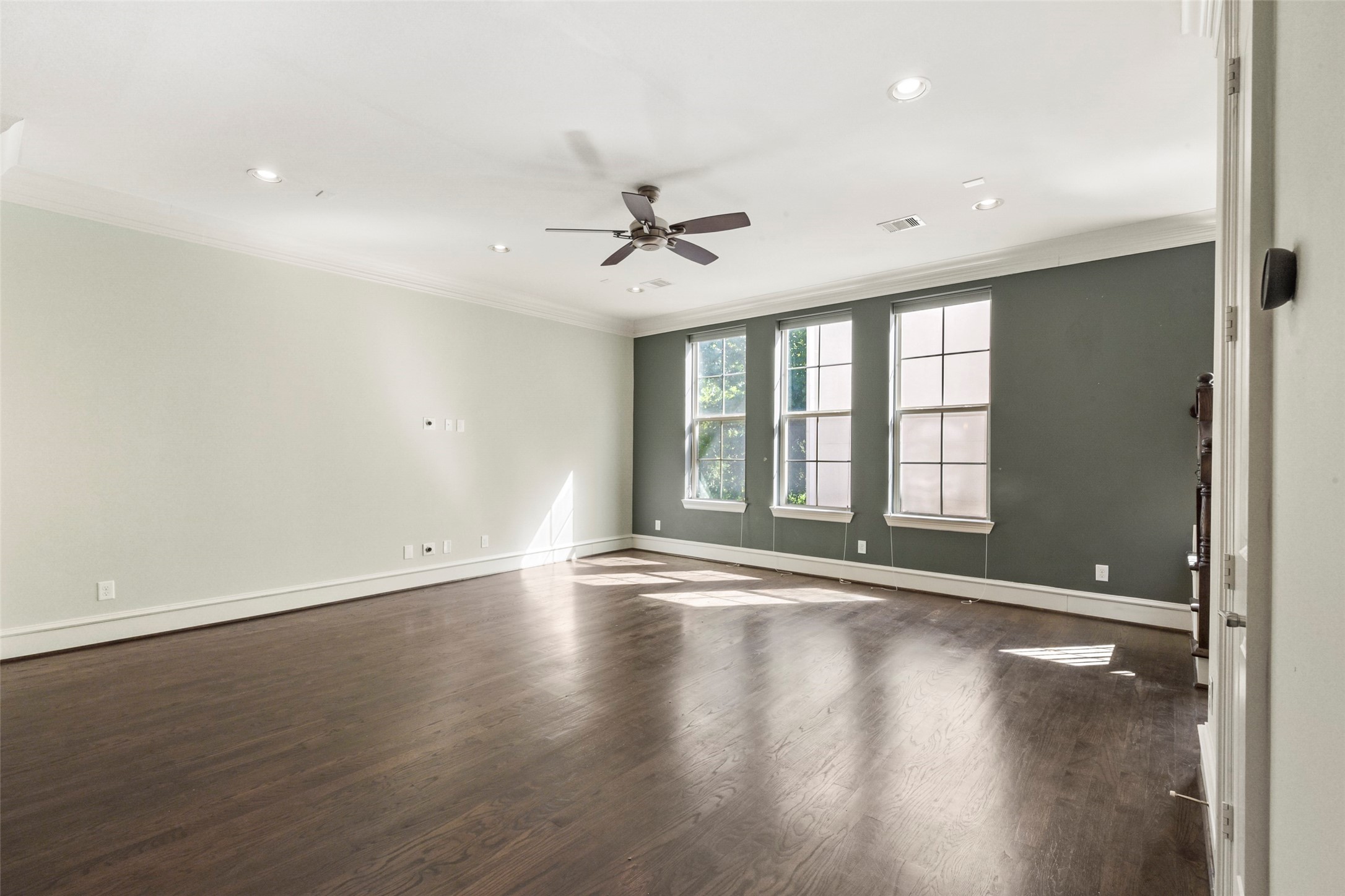 5226 Kiam Street, Unit 1018 Houston, TX 77007 - Photo 20 of 44 wooden floor in an empty room with a window
