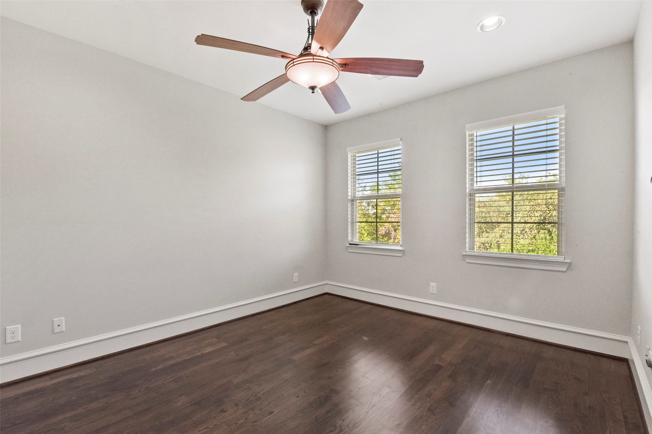 5226 Kiam Street, Unit 1018 Houston, TX 77007 - Photo 33 of 44 a view of an empty room with wooden floor and a window