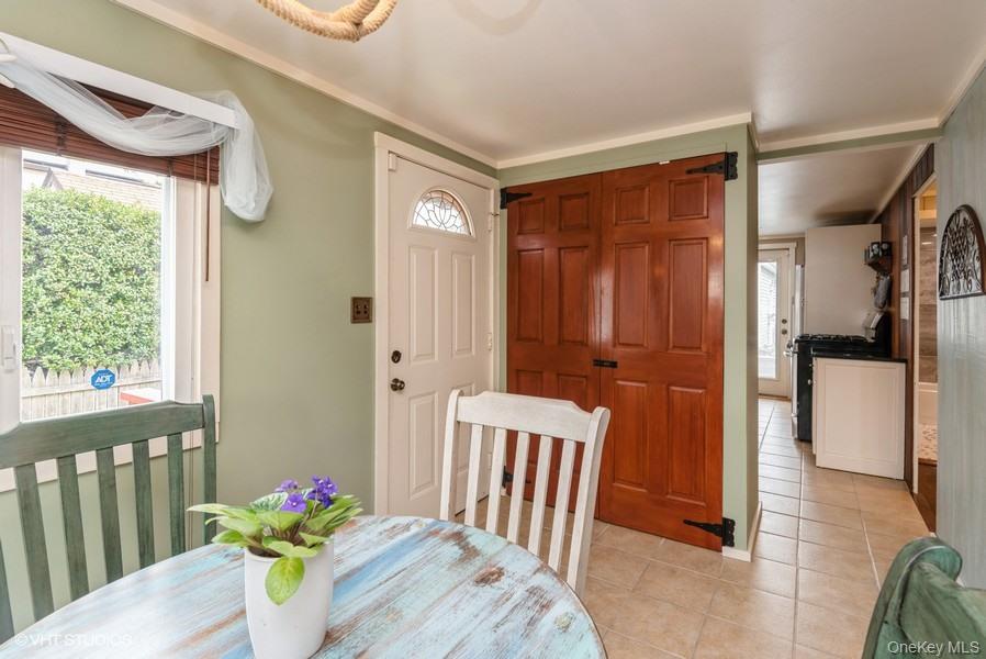 10 Stuart Avenue Babylon, NY 11702 - Photo 13 of 32 a view of a hallway and dining room