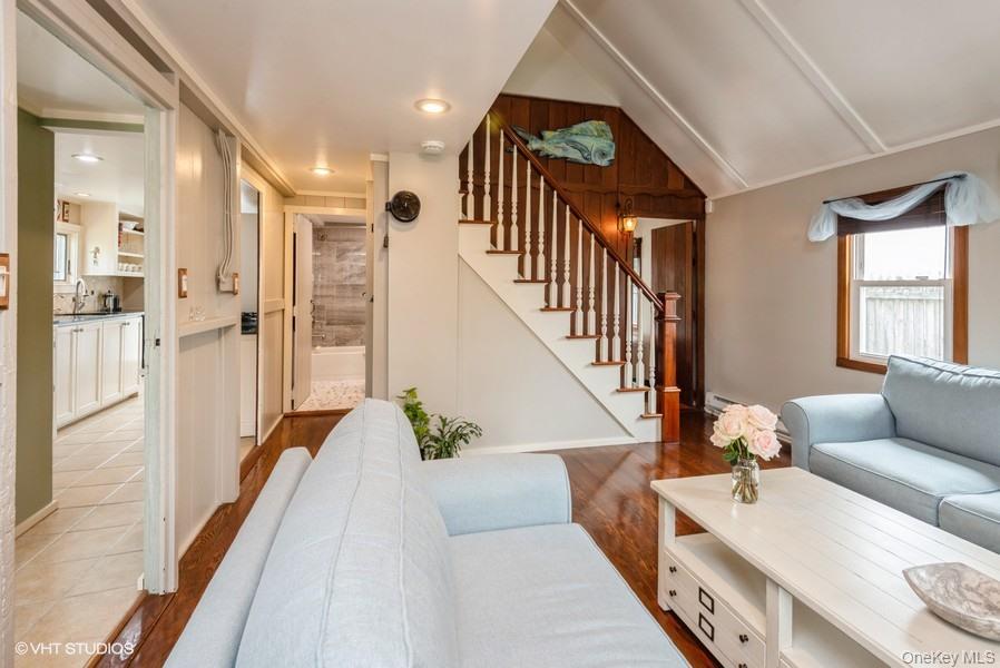 10 Stuart Avenue Babylon, NY 11702 - Photo 23 of 32 a hallway with furniture and a large window