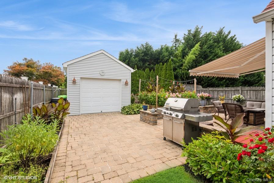 10 Stuart Avenue Babylon, NY 11702 - Photo 4 of 32 a view of a patio with chairs and plants