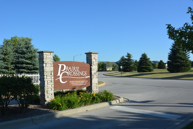 321 Pine Street Beecher, IL 60401 - Photo 5 of 5 a sign on the side of a road