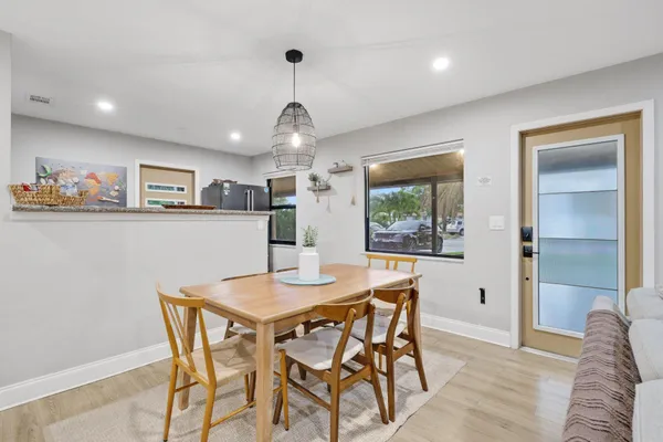 a kitchen with a stove and a sink