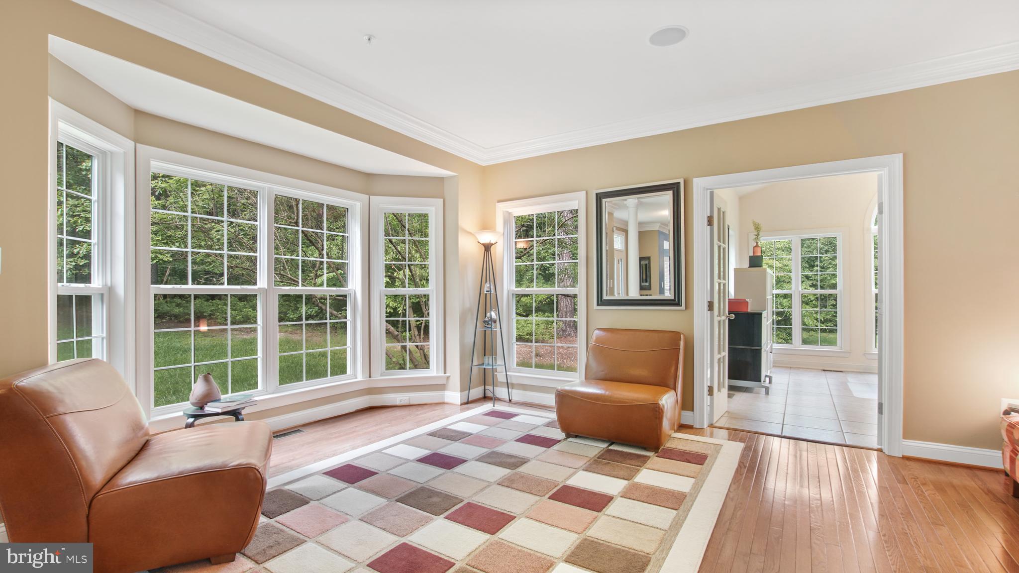 8901 Normal School Road Bowie, MD 20715 - Photo 23 of 82 VIEW OF SUNROOM AND LIVING ROOM FROM GREAT ROOM