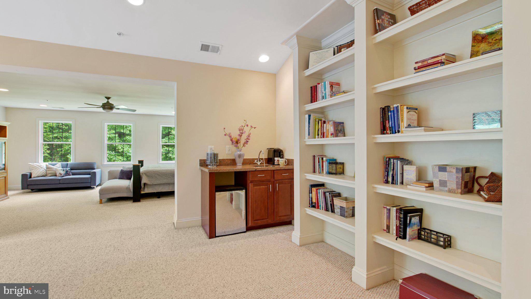8901 Normal School Road Bowie, MD 20715 - Photo 33 of 82 BUILT IN SHELVES AND COFFEE/WINE COUNTER EN-SUITE